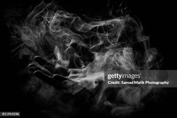 smoke - smoking stock pictures, royalty-free photos & images