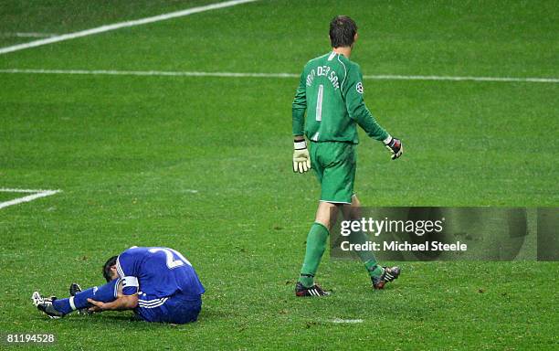 Edwin Van der Sar of Manchester United walks past John Terry of Chelsea, who has just missed a penalty attempt during the UEFA Champions League Final...