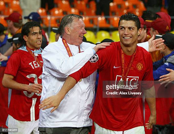 Manchester United manager Sir Alex Ferguson smiles with Cristiano Ronaldo of Manchester United after the UEFA Champions League Final match between...
