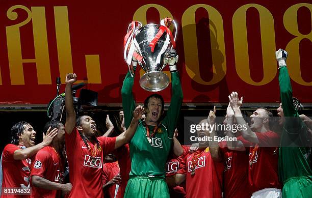 Edwin van der Sar of Manchester United lifts the trophy and celebrates their victory in the UEFA Champions League Final match between Chelsea and...