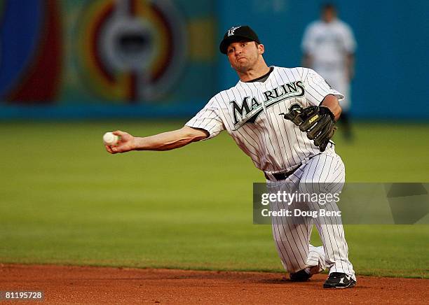 Second baseman Dan Uggla of the Florida Marlins throws to first to record the out against the Arizona Diamondbacks at Dolphin Stadium on May 21, 2008...