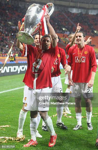 Nani of Manchester United celebrates with the trophy after winning the UEFA Champions League Final match between Manchester United and Chelsea at...