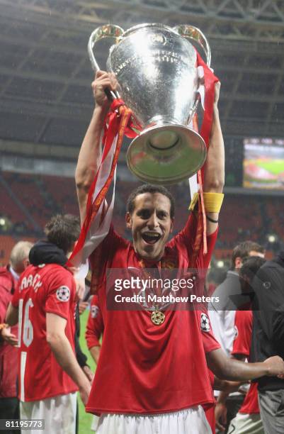 Rio Ferdinand of Manchester United celebrates with the trophy after winning the UEFA Champions League Final match between Manchester United and...