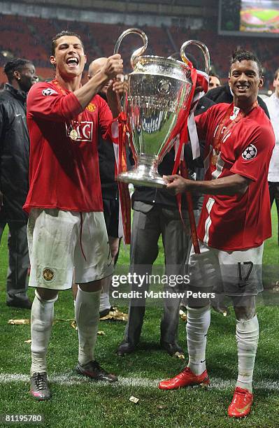 Cristiano Ronaldo and Nani of Manchester United celebrate with the trophy after winning the UEFA Champions League Final match between Manchester...