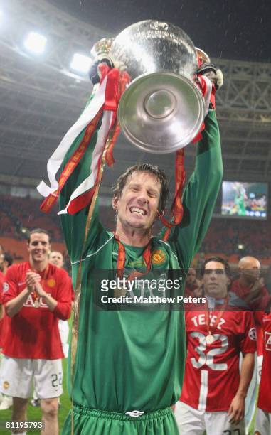 Edwin van der Sar of Manchester United celebrates with the trophy after winning the UEFA Champions League Final match between Manchester United and...