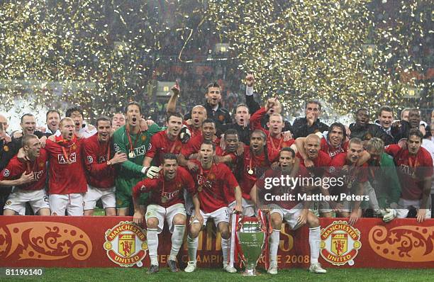 The Manchester United team celebrates with the trophy after winning the UEFA Champions League Final match between Manchester United and Chelsea at...