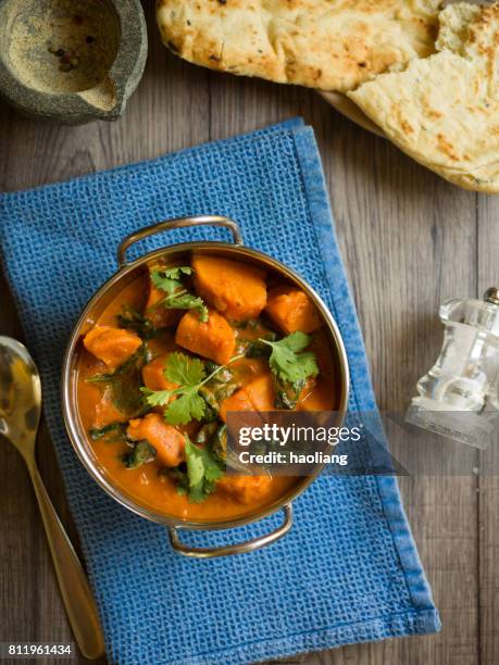 sweet potato and spinach tikka masala - crockery stock pictures, royalty-free photos & images