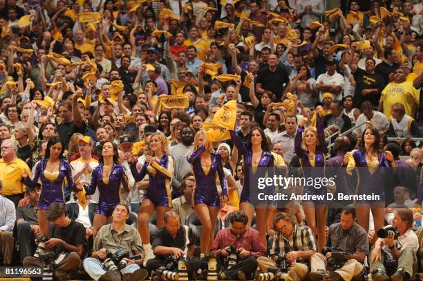 The Laker Girls and fans applaud the Los Angeles Lakers as they take on the San Antonio Spurs in the fourth quarter of Game One of the Western...