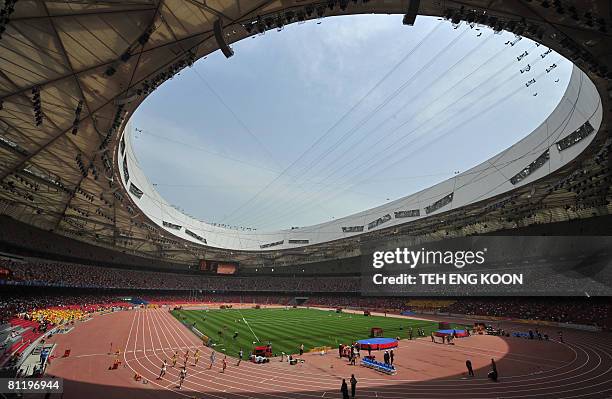 Athletes compete in the Men's 100m during the Good Luck Beijing 2008 China Athetics Open at the National Stadium, better known as the Bird's Nest, on...