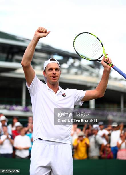 Sam Querrey of The United States celebrates victory after the Gentlemen's Singles fourth round match against Kevin Anderson of South Africa on day...