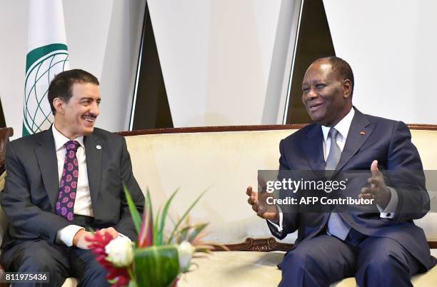 Ivory Coast President, Alassane Ouattara and President of the Islamic Development Bank , Bandar Al Hajjar meet after the opening of the 44th meeting...