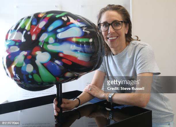 Artist Lindsi Hollend with her creation Progression - Journey through the Darkness.On July 11, more than 100 vibrantly coloured sculptures of human...