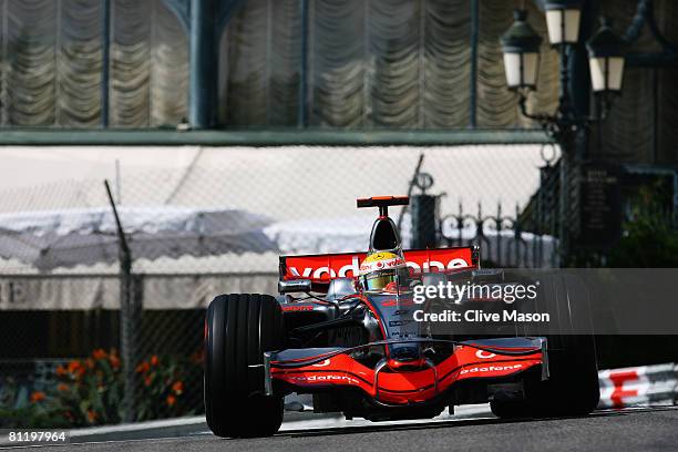 Lewis Hamilton of Great Britain and McLaren Mercedes exits Casino Square while driving during practice for the Monaco Formula One Grand Prix at the...