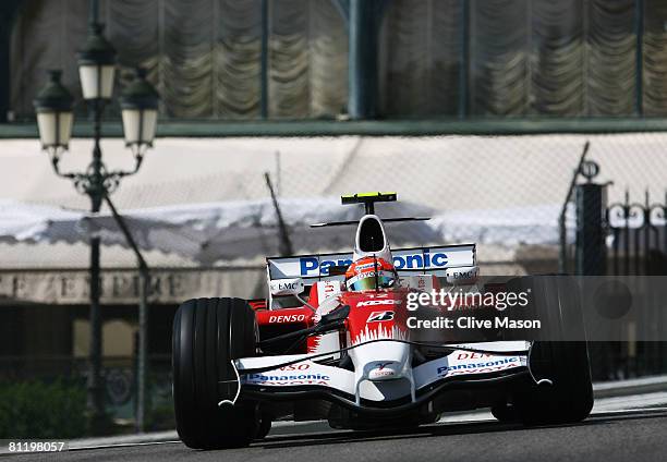 Timo Glock of Germany and Toyota exits Casino Square while driving during practice for the Monaco Formula One Grand Prix at the Monte Carlo Circuit...