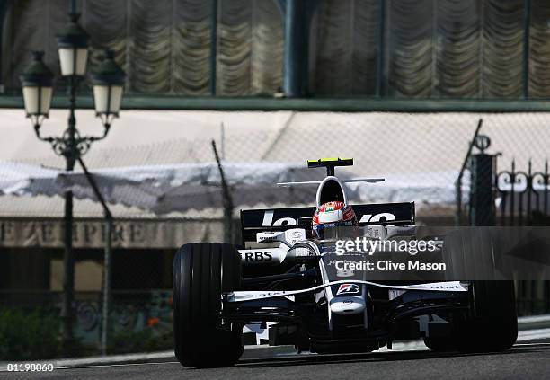Kazuki Nakajima of Japan and Williams exits Casino Square while driving during practice for the Monaco Formula One Grand Prix at the Monte Carlo...