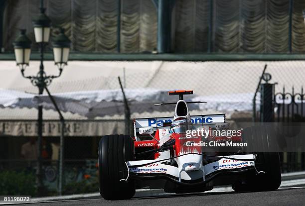 Jarno Trulli of Italy and Toyota exits Casino Square while driving during practice for the Monaco Formula One Grand Prix at the Monte Carlo Circuit...