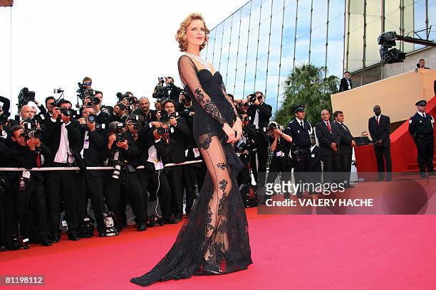Czech model Eva Herzigova poses as she arrives to attend the screening of US director Steven Soderbergh's film 'Che' at the 61st Cannes International...