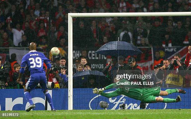 Manchester United's Dutch goalkeeper Edwin van der Sar saves a penalty by Chelsea's French forward Nicolas Anelka to win the final of the UEFA...