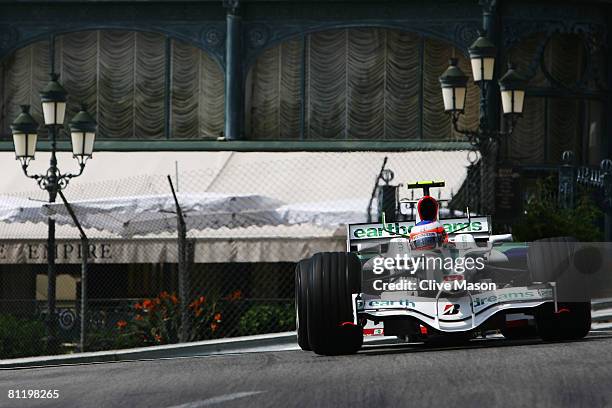 Rubens Barrichello of Brazil and Honda Racing exits Casino Square while driving during practice for the Monaco Formula One Grand Prix at the Monte...