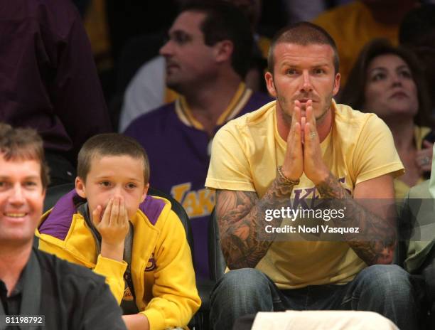 David Beckham and Brooklyn Beckham attend the Los Angeles Lakers vs San Antonio Spurs Western Conference Game 1 at Staples Center on May 21, 2008 in...