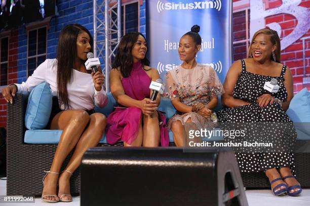 The cast of the movie Girls Trip, Tiffany Haddish, Regina Hall, Jada Pinkett Smith and Queen Latifah speak during the Essence Music Festival at the...
