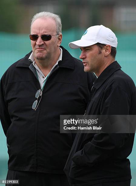 Darrell Hair, who will return to umpiring in the upcoming Test, stands with fellow umpire Simon Taufel during training at Old Trafford Cricket Ground...