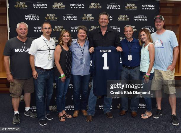 Dave Dewaard & Gary Dewaard of BASIS Entertainment with Cory Chapman, Lynn Chapman, Sandy Barbour, Phil Esten and Dani Esten of Penn State University...