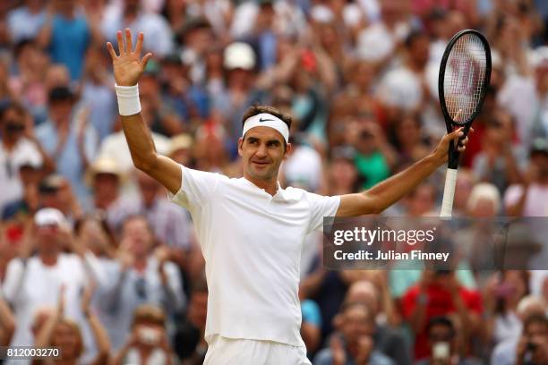 Roger Federer of Switzerland acknowledges the crowd as he celebrates victory after the Gentlemen's Singles fourth round match against Grigor Dimitrov...