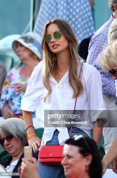 Ester Satorova wife of Tomas Berdych looks on after his Gentlemen's Singles fourth round match victory against Dominic Thiem of Austria on day seven...