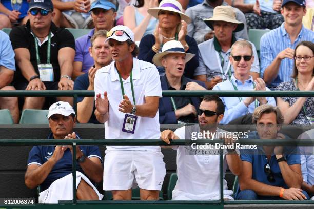 Toni Nadal coach of Rafael Nadal of Spain and his team react during his Gentlemen's Singles fourth round match against Gilles Muller of Luxembourg on...