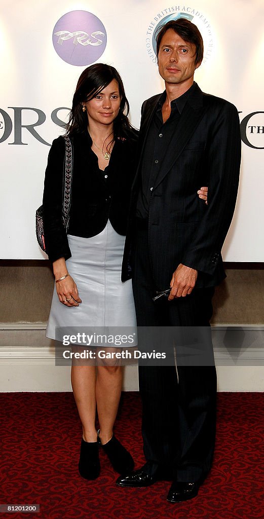 Brett Anderson and his guest arrive at the 53rd Ivor Novello Awards