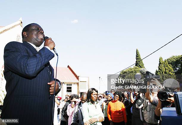 Zimbabwean opposition leader Morgan Tsvangirai addresses a crowd of Zimbabwean refugees, sheltering in a tent camp near Primrose police station and a...