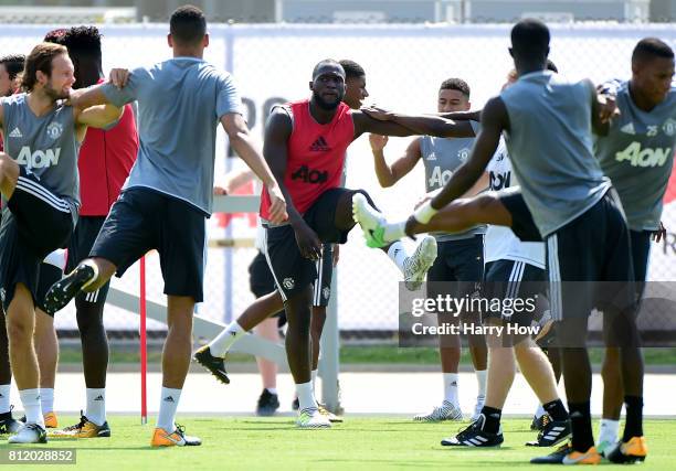 Romelu Lukaku of Manchester United stretches with teammates during training for Tour 2017 at UCLA's Drake Stadium on July 10, 2017 in Los Angeles,...