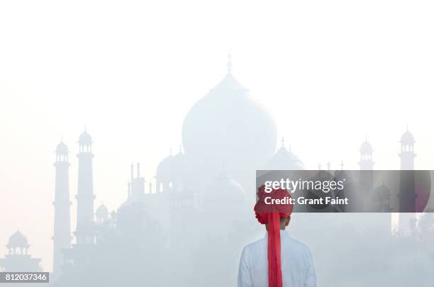 tour guide near taj mahal. - indian tour guide stock pictures, royalty-free photos & images