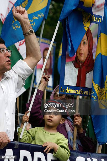 Elia Zaraei, a young Iranian demonstrates with his family as supporters of the People's Mujahedin Organisation of Iran protest to have the Iranian...