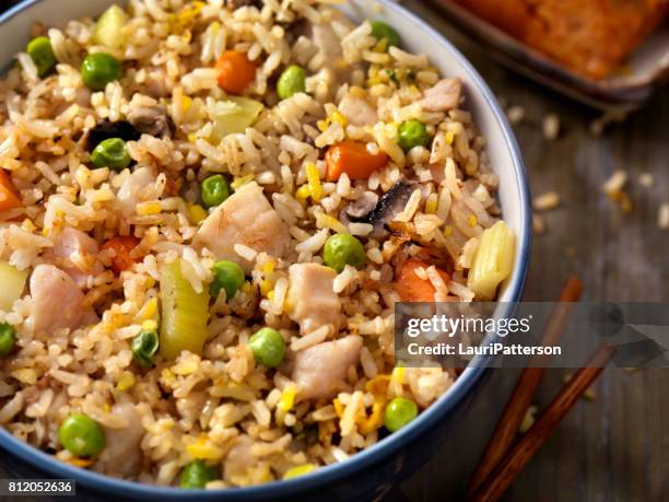 chicken and vegetable fried rice - rice stock pictures, royalty-free photos & images