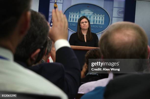 Principal Deputy White House Press Secretary Sarah Huckabee Sanders pauses during a White House daily briefing at the James Brady Press Briefing Room...