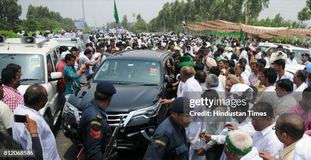 Leader Abhay Chautala and other party workers during the protest on SYL issue at Saddopur barrier, border of Punjab and Haryana on July 10, 2017 in...