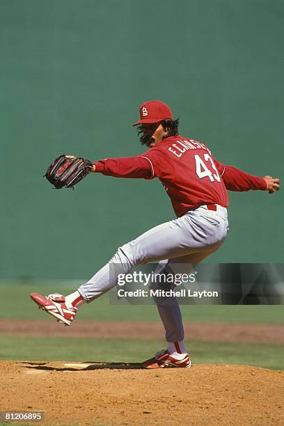 Dennis Eckersley of the St. Louis Cardinals pitches during an exbition baseball game against the Philadelphia Phillies on March 23, 1997 at Jack...