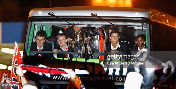 Michael Carrick, Wayne Rooney, Cristiano Ronaldo and Luis Nani arrive back from Moscow after their win over Chelsea in the Champions League final May...
