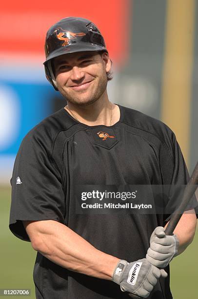 Luke Scott of the Baltimore Orioles looks on before a baseball game against the Washington Nationals on May 17, 2008 at Camden Yards in Baltimore,...