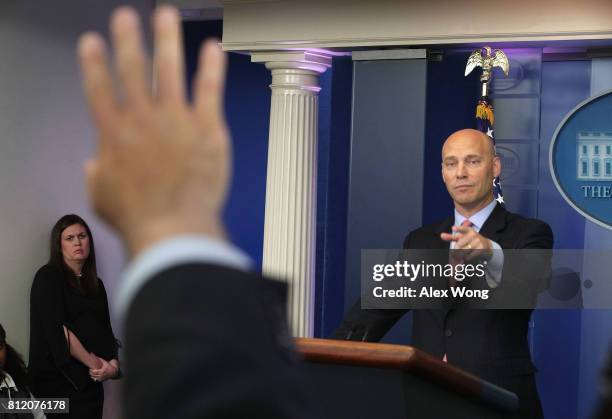 White House Director of Legislative Affairs Marc Short speaks as Principal Deputy White House Press Secretary Sarah Huckabee Sanders looks on during...