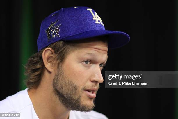 Clayton Kershaw of the Los Angeles Dodgers and the National League speaks with the media during Gatorade All-Star Workout Day ahead of the 88th MLB...