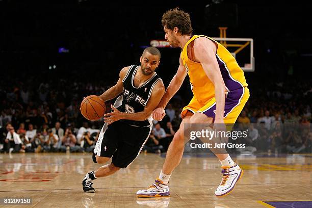 Tony Parker of the San Antonio Spurs drives on Pau Gasol of the Los Angeles Lakers in Game One of the Western Conference Finals during the 2008 NBA...