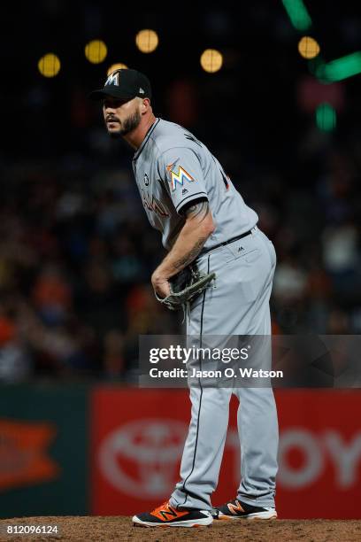 Dustin McGowan of the Miami Marlins stands on the pitchers mound against the San Francisco Giants during the ninth inning at AT&T Park on July 7,...