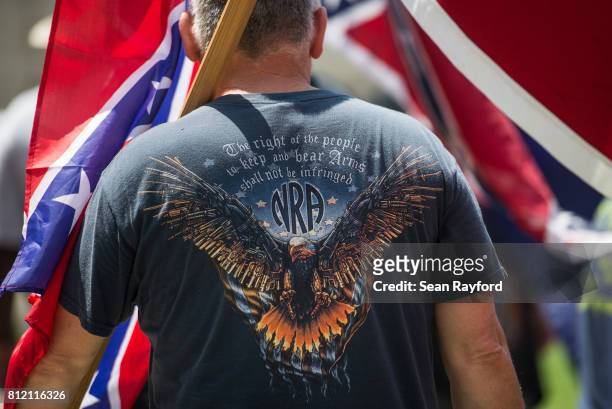 Pro-Confederate flag demonstrator wears a National Rifle Association t-shirt at the South Carolina Statehouse on July 10, 2017 in Columbia, South...