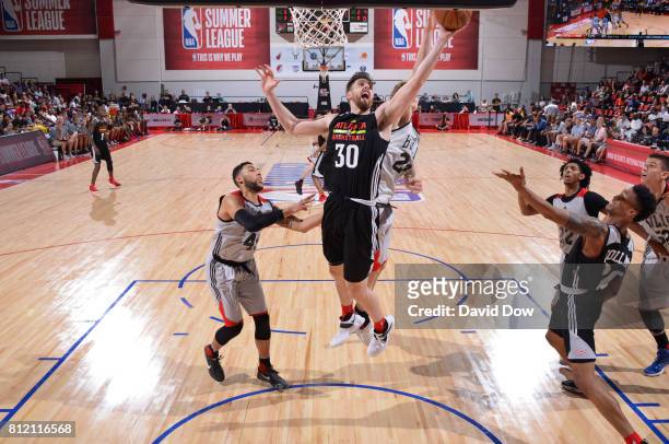 Ryan Kelly of the Atlanta Hawks grabs the rebound against the Chicago Bulls during the 2017 Las Vegas Summer League on July 10, 2017 at the Cox...