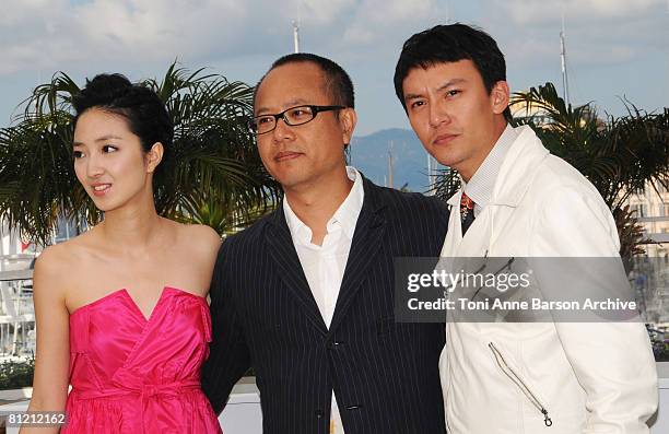 Lun Mei Kwai, Director Mong Hong Chung and Actor Chen Chang attend the "Ting Che" photocall at the Palais des Festivals during the 61st International...