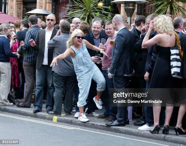 Lily Allen enjoys a drink at The Audley for the after party of the Ivor Novello Awards on May 22, 2008 in London, England.