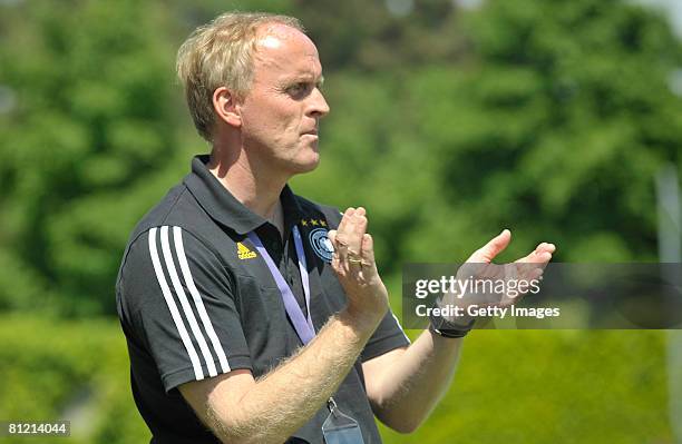 Head coach Ralf Peter of Germany gestures during the UEFA Women's U17 European championship match between Germany and France at the Colovray stadium...